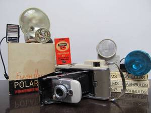 lot 18 image: Nice Vintage POLAROID Camera wAccessories