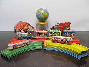 lot 97 image: Nice Group of Vintage Tin Litho Toys - Disney Train etc