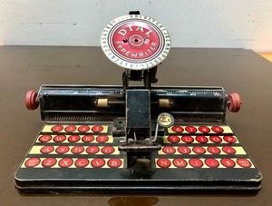lot 204 image: Very Cool Vintage Tin DIAL Typewriter