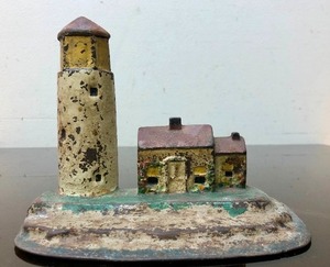 lot 259 image: Original Antique Cast Iron Lighthouse Door Stop
