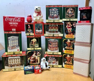 lot 363 image: LARGE Lot of Mint in Box COCA COLA Christmas Houses & Other Display Items