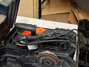lot 615 image: Coleman 4-12 Angle Grinder with Case
