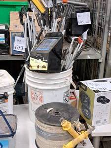 lot 784 image: Electric Fence - (35) Posts, Spool of Wire, Solar Panel