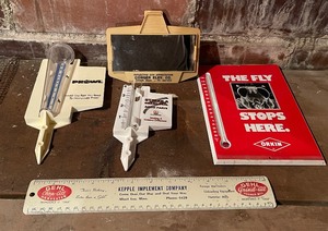 lot 163 image: Advertising LOT - Kepple Implement Metal Ruler, Metal and Plastic Rain Gauges, Thermometers,