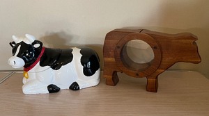 lot 228 image: Mooing Cow Cookie Jar and Cow Bank