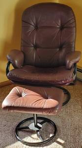 lot 111 image: Swivel Recliner Chair and Ottoman