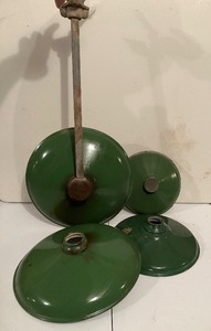 lot 18 image: Four Vintage Everlast Enameled Green Lamp Shades and One Fixture