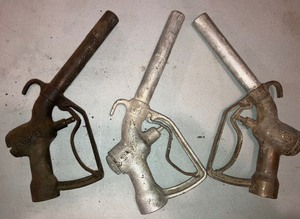 lot 29 image: Three Vintage Barrel Pump Nozzles