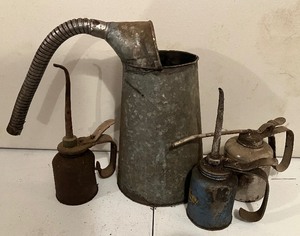 lot 38 image: Three Vintage Pump Oilers, One Galvanized Oil Can  Pitcher