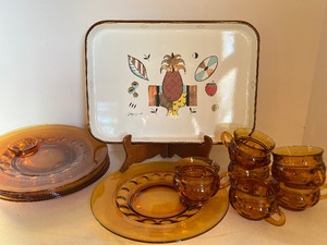 lot 214 image: Georges Briard MCM Ambrosia Pattern Enamel Tray and Mid Century Amber Glass Snack Set Indiana King Crown