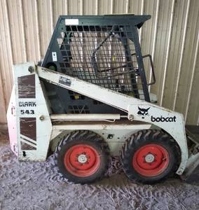 Bobcat 543 skid loader 2,025 hrs with bucket and bale spear
