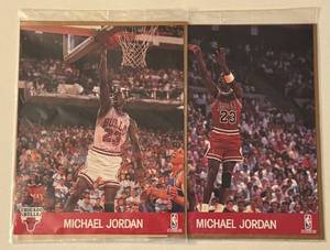 lot 19 image: Michael Jordan NBA Hoops Action Photos Team Sets of 2 - Basketball Cards