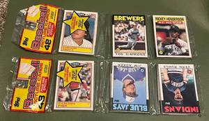 lot 49 image: (2) 1986 Topps Rack Packs - Rickey Henderson, Robin Yount, Tom Seaver, Carlton Fisk - Baseball Cards