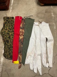 Lot of 10 -gun sleeves and 1- bow sleeve