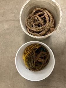 2 - 5 gallon. buckets with assorted ropes.