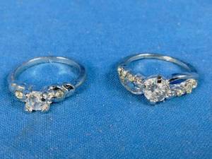 lot 64 image: 2 New Womens Stainless Steel and Cubic Zirconia Rings Size 8.5