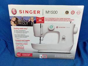 lot 3 image: Singer 57 Stitch Sewing Machine M1500