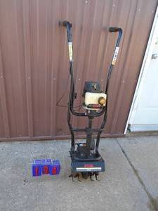 Ryobi 31cc mini tiller. Used condition. Tested & works. As shown.