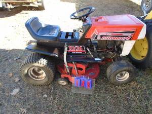 Dynamark 1036 lawn mower. Used. Has compression. Turns over. Wont start. For parts or repair. As shown.