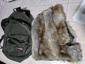 lot 23 image: Eastpak Backpack and a Comfortable Large Winter Hat (New)