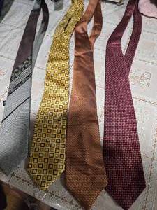 lot 33 image: Four High Profile Brand Neckties ( B & R 100%, Marty Mathis, Geoffery Beene, and  Brooks Brothers Neckties)