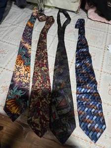 lot 34 image: Four High Profile Brand Neckties ( Rohde-Royce, 100% SETA, Martin Wong and Bachrach Neckties)