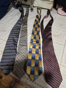 lot 37 image: Four High Profile Brand Neckties(Haggar Clothing Co, Egon Von Furstenberg, Arrow and Executive Collection Neckties)