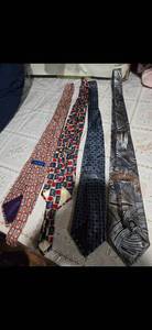lot 42 image: Four High Profile Brand Neckties (Perry Ellis Pure Silk Fumagallis Perry Ellis Portfolio and  Tasso Eba Designed Necktie )
