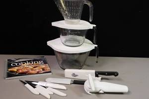 lot 221 image: Pampered Chef Two-Size Covered Glass Measuring Cup Pitcher, Knives, Cookbook Etc