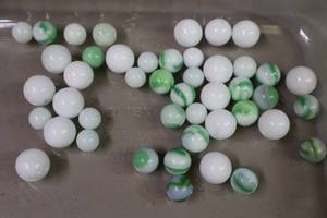 lot 261H image: Vintage Marble Collection16-White Milk Glass 12-Inch, 18-Green White Milk Glass Swirl Vitro, 11-White Marbles