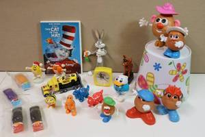 lot 274 image: Collectible Tiny Toys Mr. Potato Head, M & Ms, The Cat in the Hat DVD, Mini Alarm Clock Etc