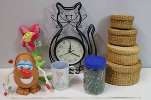 lot 280 image: Marbles and Shooters, Mr. Potato Head, Cat Clock, Woven Wicker Stacking Basket Set