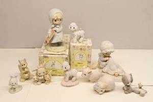 lot 282 image: Vintage 80s Precious Moments Figurines Love Covers All 1987 March Ewe Hello World Etc.