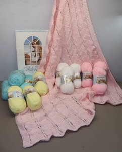 lot 315 image: Baby Blanket Knit Crocheted Project StartedFinished wAdditional Yarn