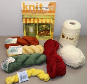 lot 345 image: Wool Sock Scarf Yarn By Cascade Yarns, Dream Socks and Lion Brand Yarn Cone Etc.