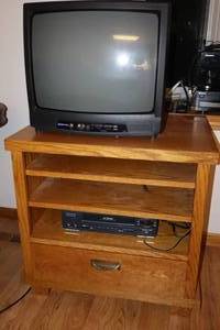 lot 372 image: Vintage Emerson TV, VHS Player wSolid Oak Console One-Drawer Media-Stand Cabinet