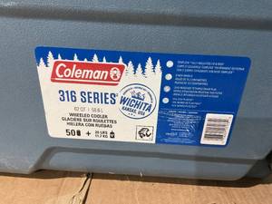 lot 252 image: Coleman 316 Series 62QT Hard Chest Wheeled Cooler