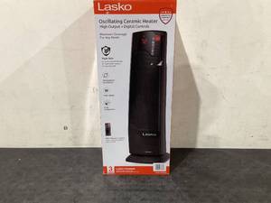 lot 577 image: Lasko 22 1500W Oscillating Ceramic Tower Space Heater with Remote, Black, CT22835