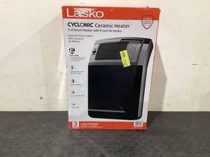 lot 582 image: Lasko 1500W Cyclonic Ceramic Console Electric Space Heater with Timer, CC24925, Black