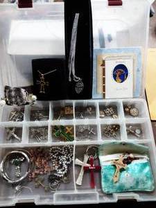lot 28 image: Organizer Full Of Crosses, Charms, Rosaries & Other Religious Items