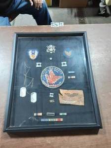 lot 61 image: Framed Patches, Medals & Dog Tags 17x21