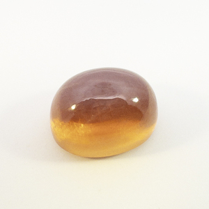 LAB GROWN ORANGE STAR SAPPHIRE  - 9.01ct. Oval cabochon cut