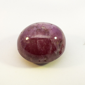 LAB GROWN STAR RUBY  - 15.71ct. Oval cabochon cut