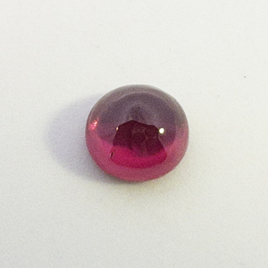 LAB GROWN RUBY - 0.35ct. Round cabochon cut