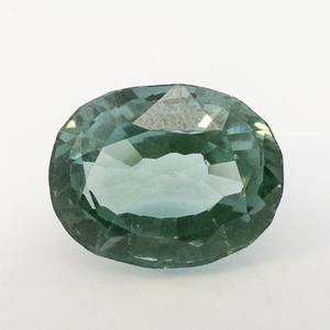 CREATED TEAL SPINEL - 13.63ct. Oval brilliant cut