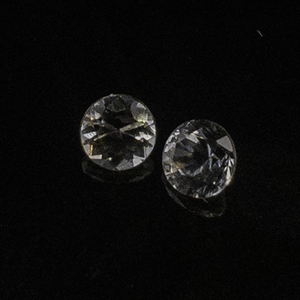 Pair of WHITE SAPPHIRE - 0.29ct. Round brilliant cut