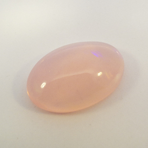 PINK OPAL (DYED) - 5.12ct. Oval cabochon cut
