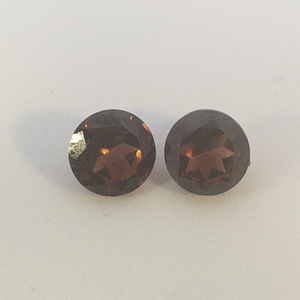Pair of TANGA GARNET  - 1.32 twct. Round brilliant cut