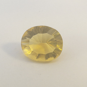 FIRE OPAL - 1.64ct. Concaved Facted Oval Cut
