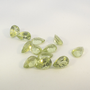 12 PERIDOT - 5.45ct. Pear shape brilliant cut